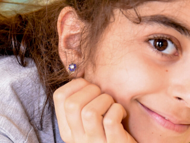 Caritas Kinder & Jugend – Porträt eines lächelnden Mädchens