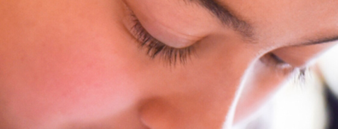 Child concentrating while writing